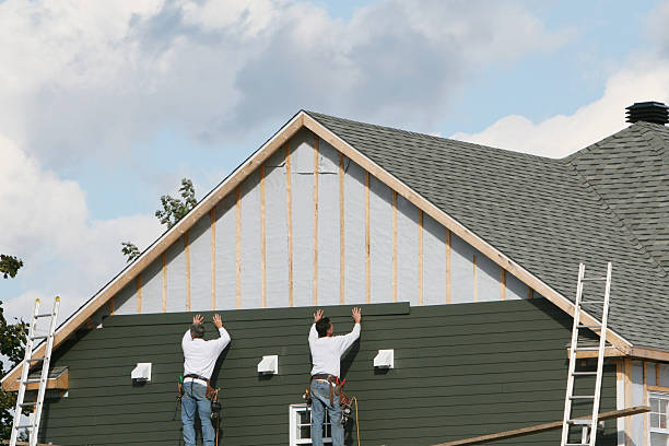 Professional Siding Replacement technician working in Medfield, MA